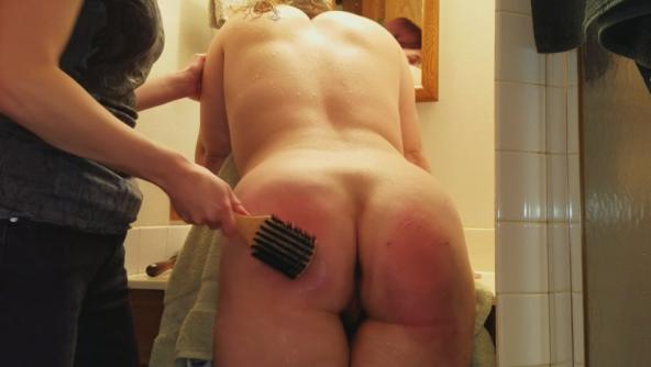 Missy Spanked with Bathbrush and Hairbrush for Showering too long