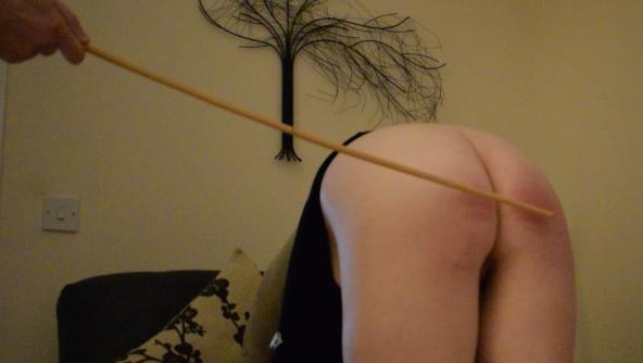 Bent over and caned!