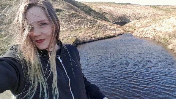 Sophie's Selfie Head Trampling Outdoors On Concrete In Sneakers